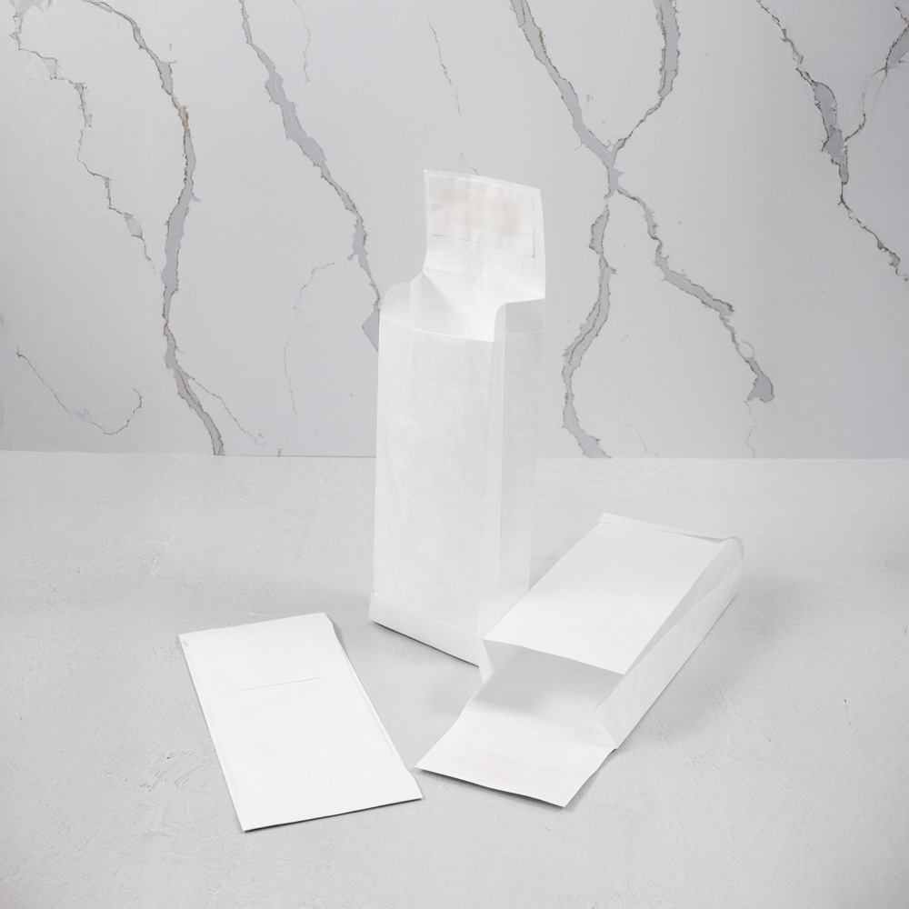White 14lb 4 1/2 x 9 1/2 x 2 Open End Envelopes with Peel & Seal and V-Bottom