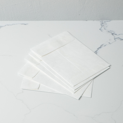 White Tyvek 14lb 5 1/2 x 7 1/2 Open End Envelopes with Peel & Seal