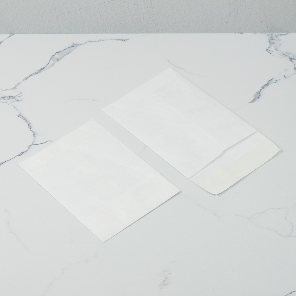 White Tyvek 14lb 5 1/2 x 7 1/2 Open End Envelopes with Peel & Seal