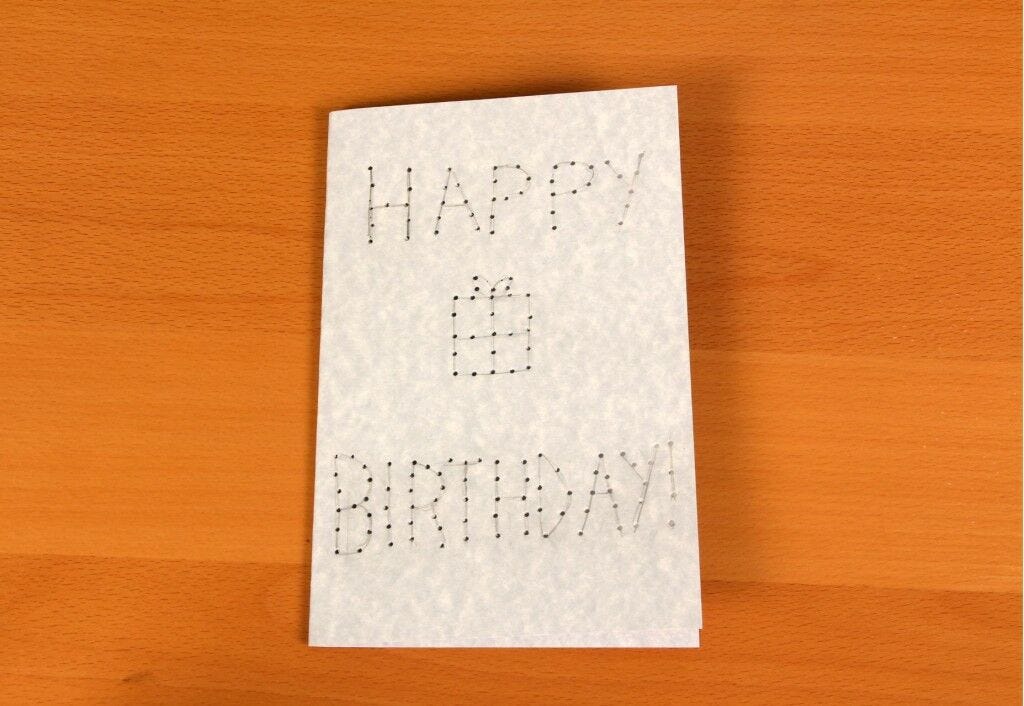 All Holes Punched Happy Birthday card with holes punched