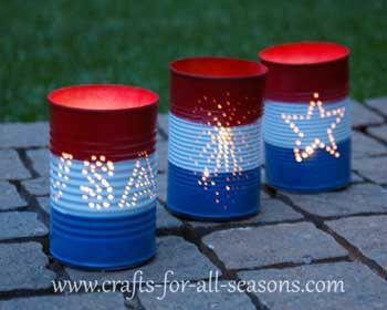 Red, white, and blue striped can lamps with hole-punched designs