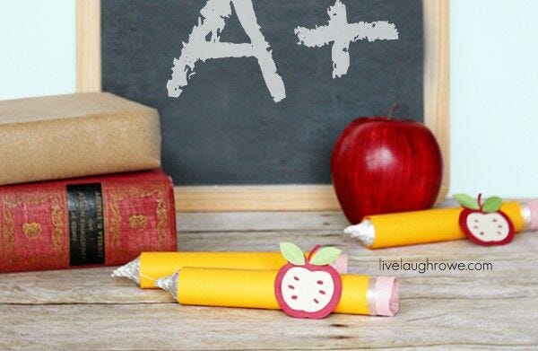 Rolo Pencil on desk Candy pencil treat - desk, apple, chalkboard, books