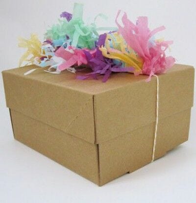 box with colorful tissue paper shreds on top