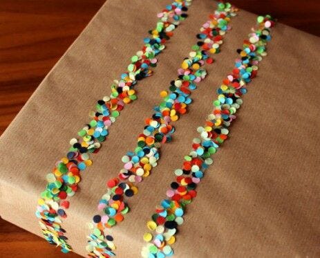 Confetti Inspired Wrapping rainbow confetti tissue paper creative gift bow idea