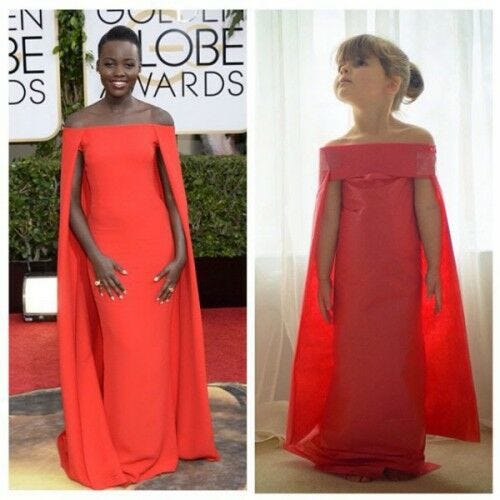 Lupita Nyong'o red dress little girl in matching dress