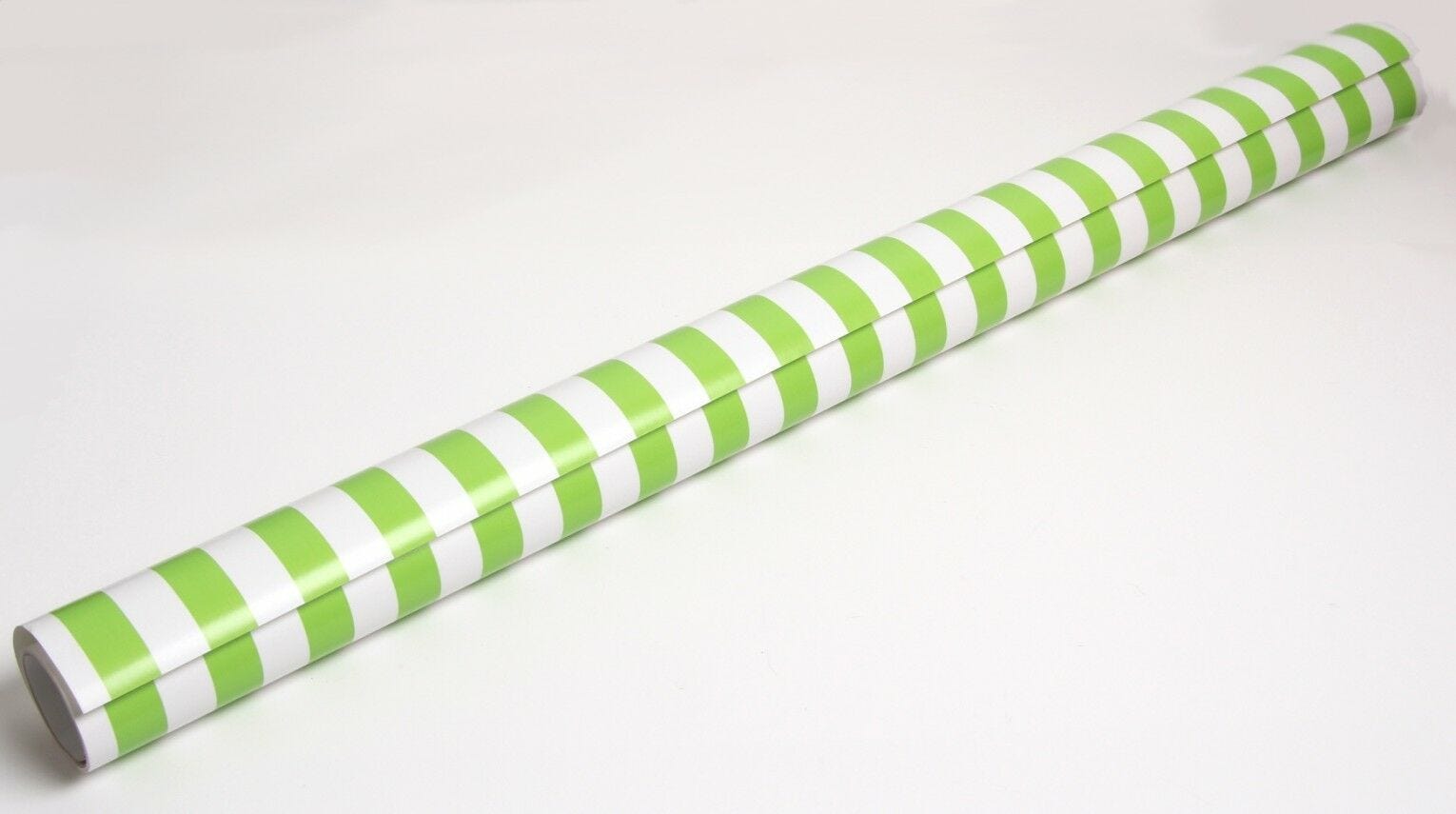 green and white striped wrapping paper roll