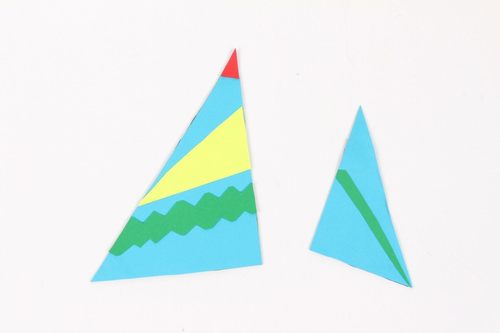 cardboard triangles decorated with colored paper