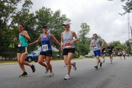 runners in 5k race to build marathon on street