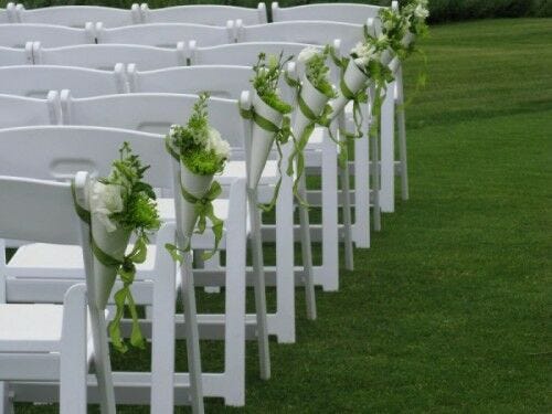 Flowers in cones on chairs