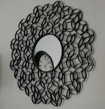 Flower pattern around mirror