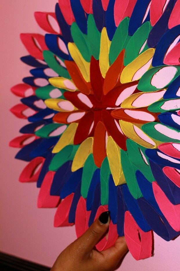 Completed rainbow flower toilet paper roll craft