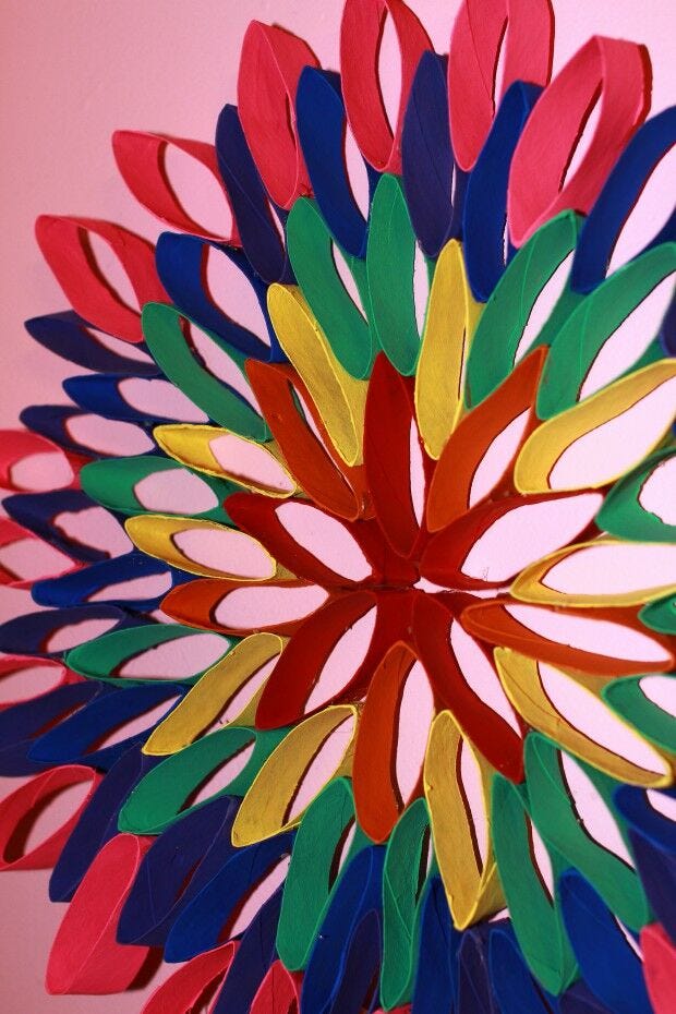 Completed rainbow flower toilet paper roll craft