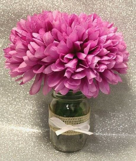 pink flowers in Mason jar