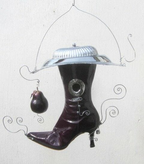 black heeled boot birdhouse