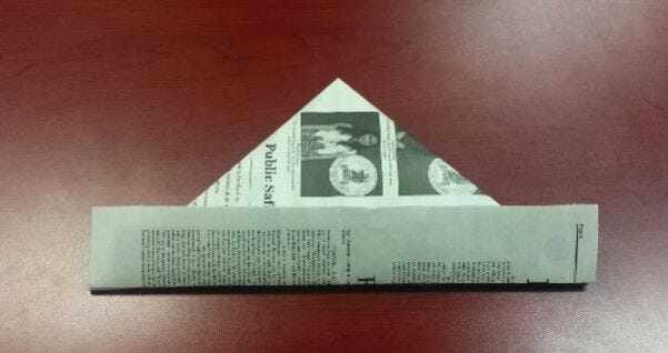 Newspaper with bottom folded up