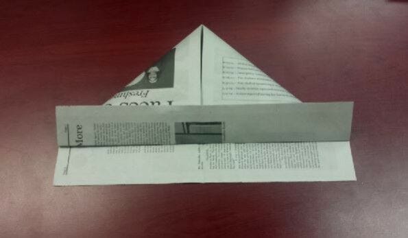 Newspaper with bottom folded up
