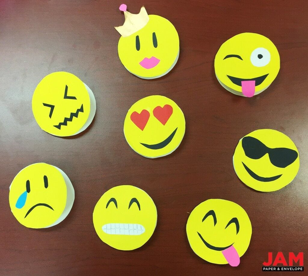 assortment of homemade emoji cards 