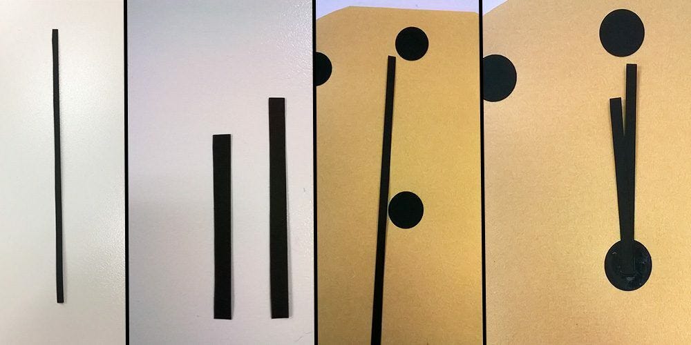 Black strips glued to yellow circle cutouts