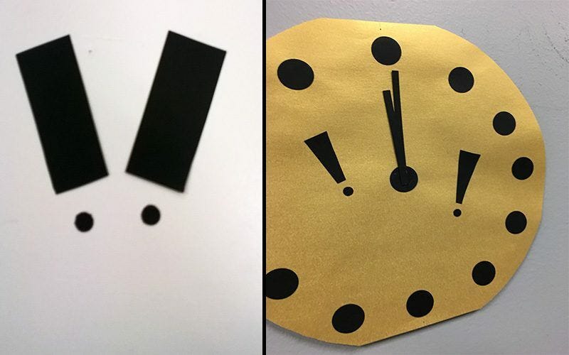 Exclamation points glued to yellow clock