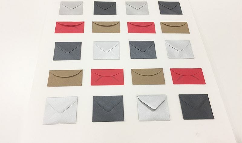 Multi-colored envelopes on board