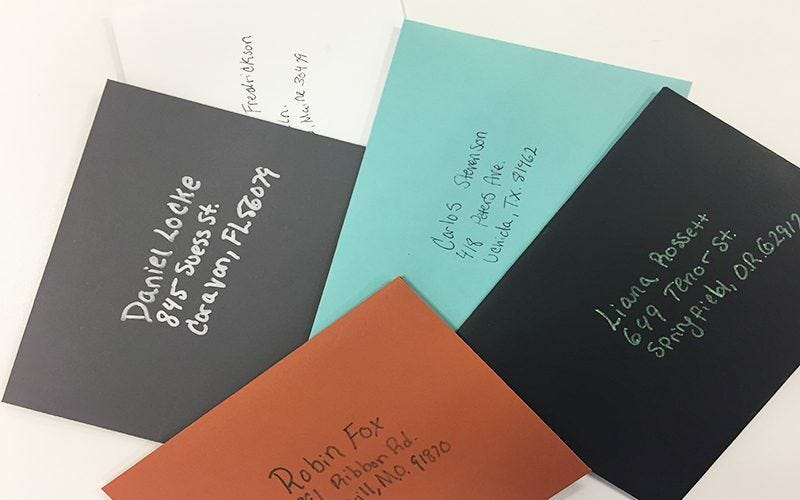 Addressed envelopes in different colors