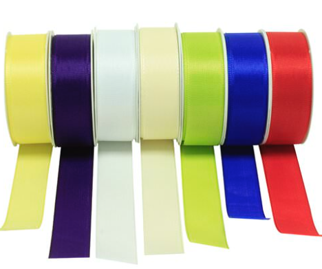 Colorful ribbons multicolored rolls in a row