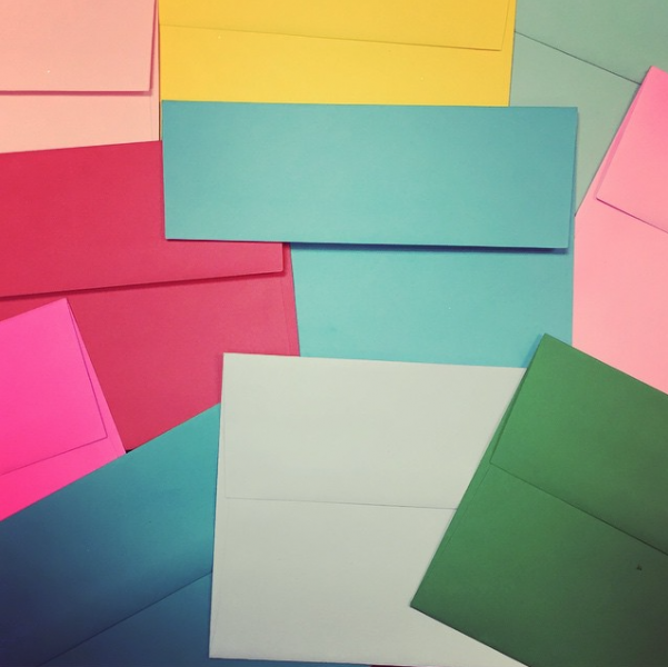 multicolored colorful envelopes office supply close up