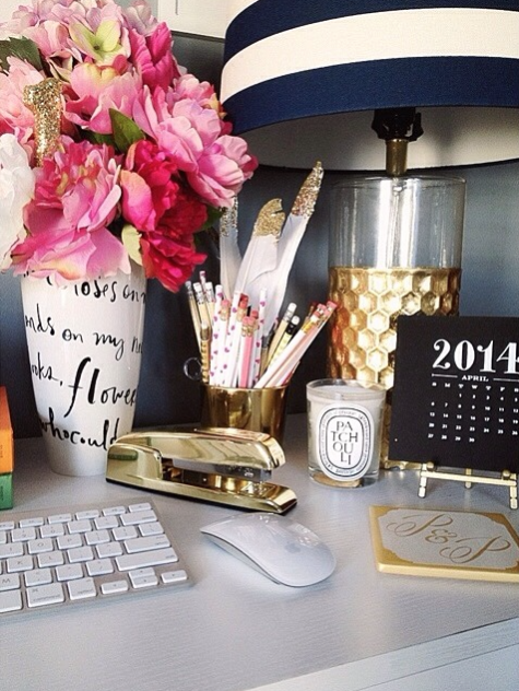 Organized desk, supplies nearby clean desk. gold accents, office supplies, work space, flowers, calendar