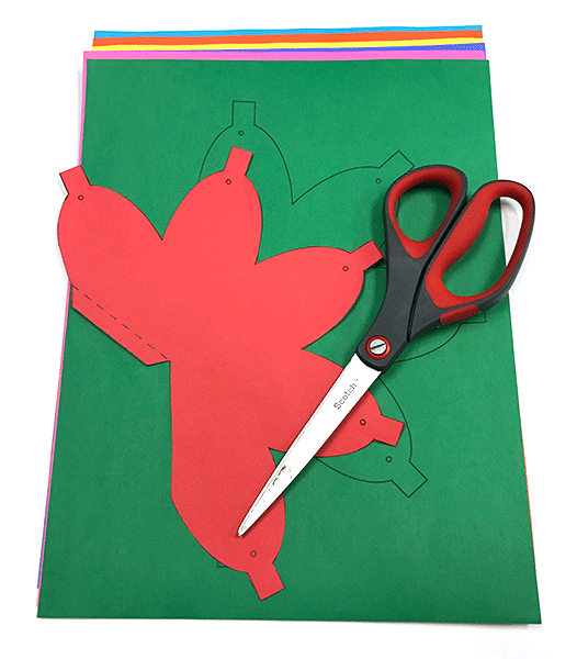 Scissors and card stock paper - Christmas light shape cut out of card stock