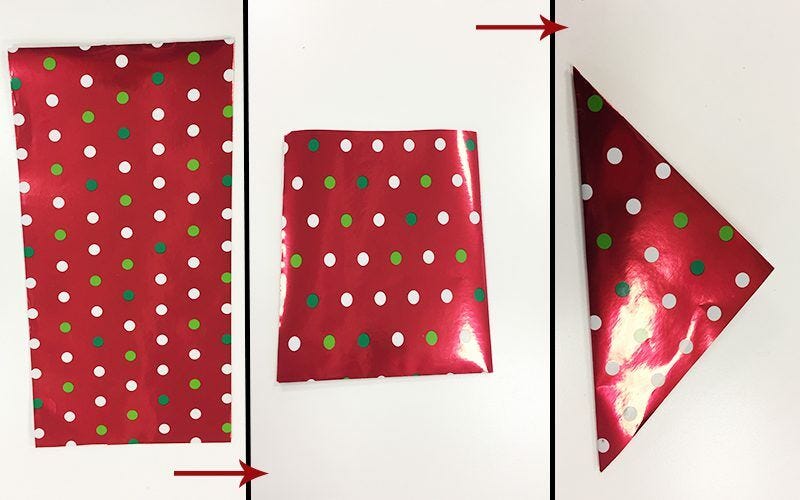 Red wrapping paper folded into triangle