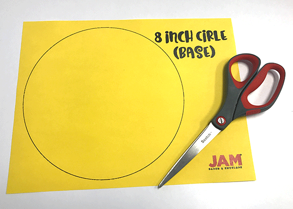 Yellow paper with 8 inch circle, scissors