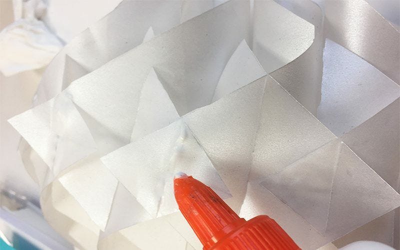 Clear-dry glue applied along the smallest slits on cross sections Clear-dry glue applied to cross sections along smallest slits