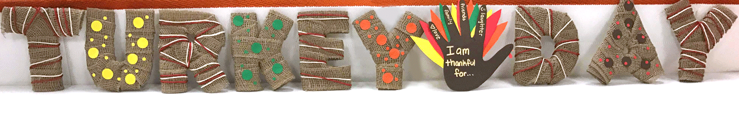 turkey day in diy burlap letters decorated with colorful twine and paper dots with hand turkey in center