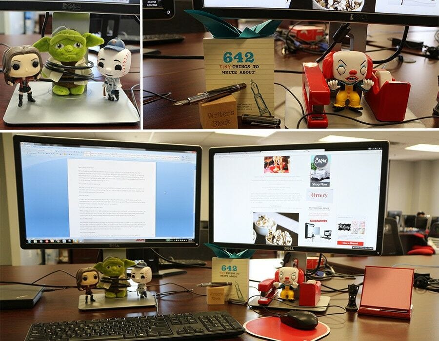 Decorated workspace - desktop monitors with bobbleheads