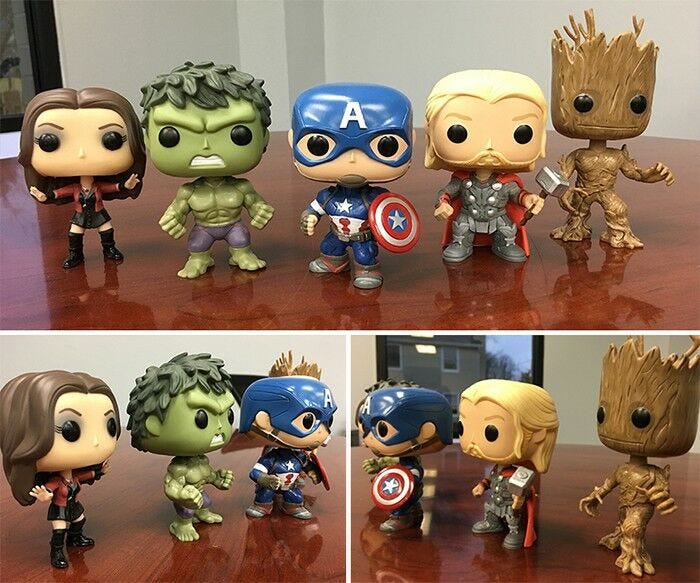 avengers bobblehead collection lined up on desktop for stress free office space