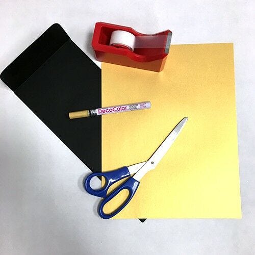 Oscar Statue Invitation Materials materials for oscar trophy invite - black envelope, gold paper, gold le pen, tape, scissors