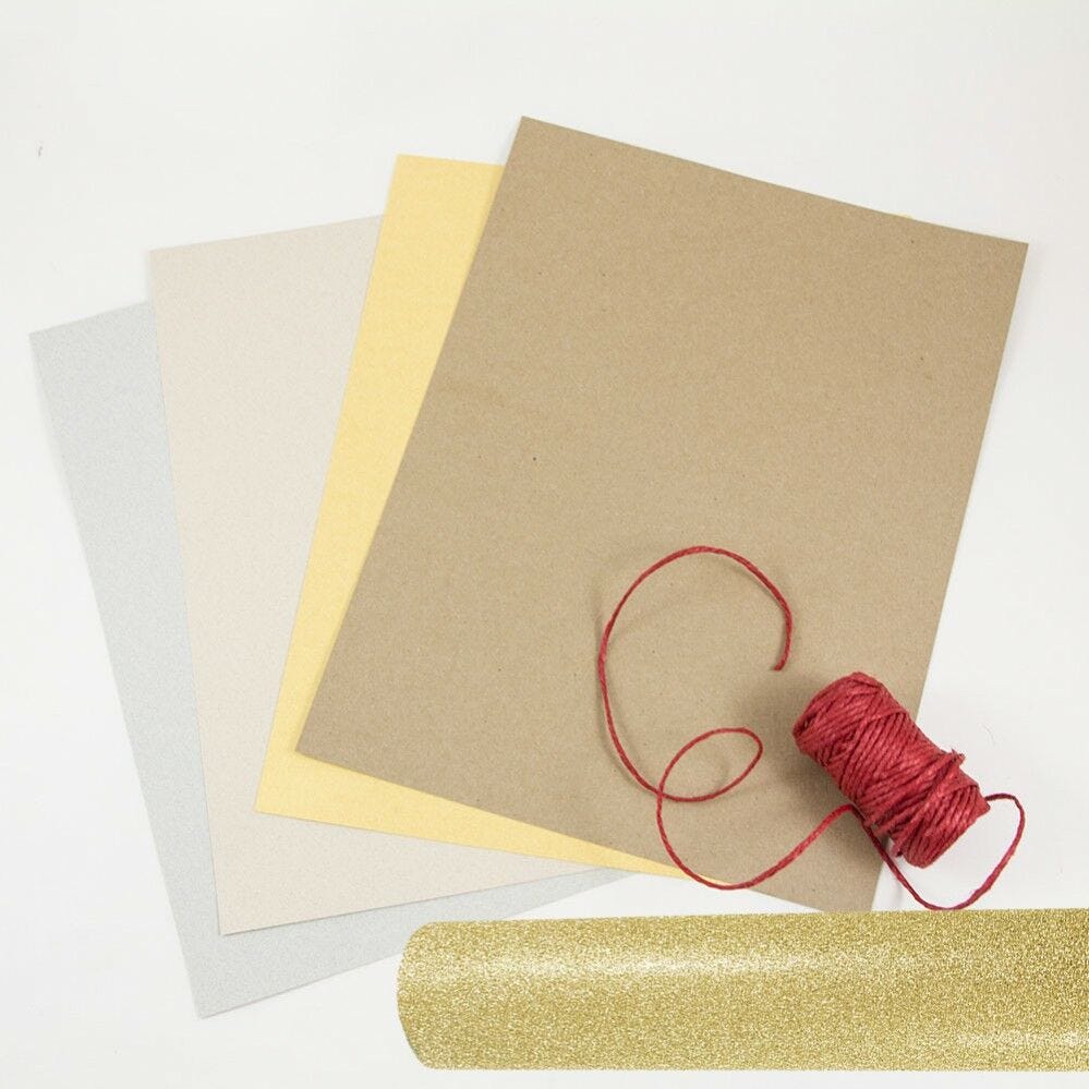 Colored paper, red twine, gold wrapping paper