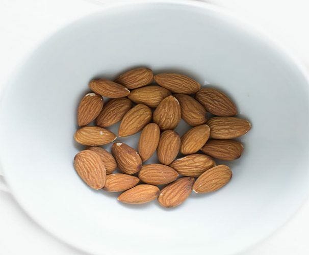 Almonds in white bowl