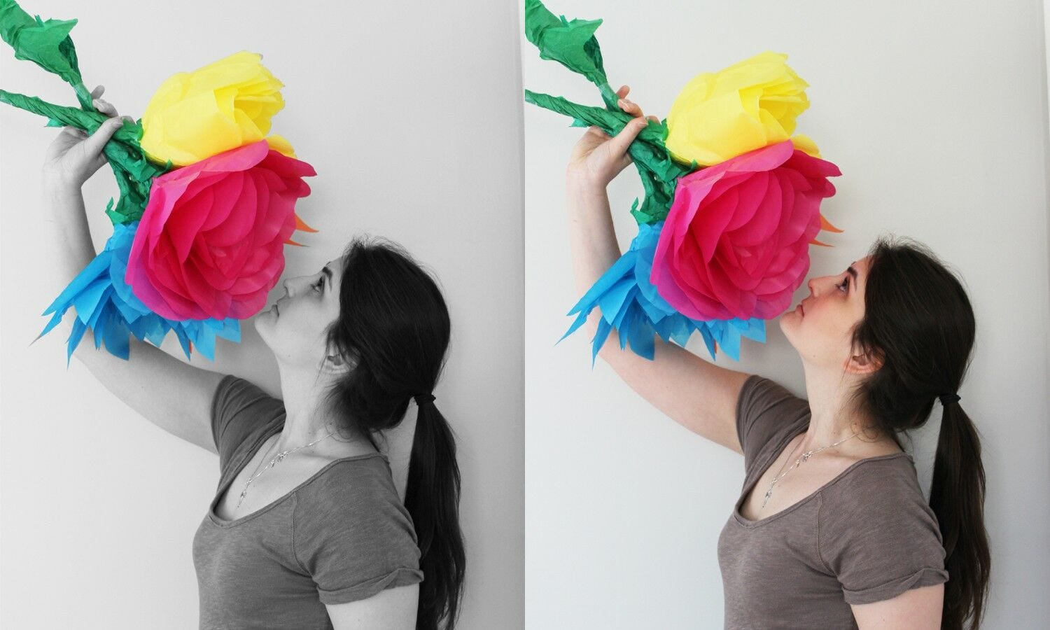 girl smelling tissue paper flowers