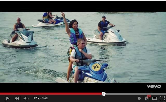 cool for the summer Gold wafer seal on Demi Lovato jet ski