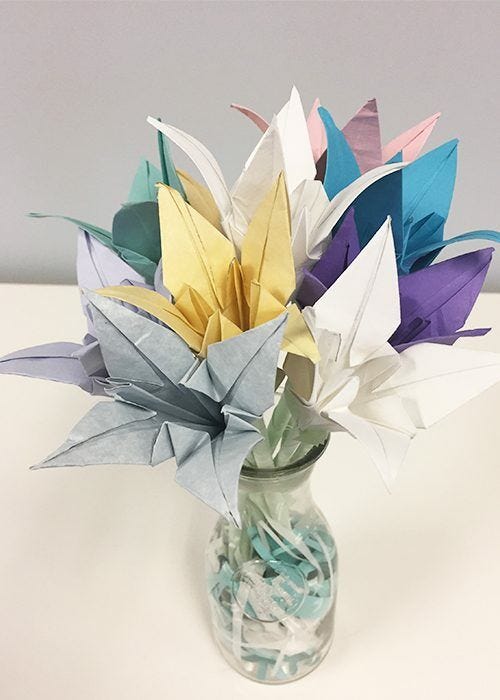 How To Make Paper Origami Easter Lilies, all lilies, vase, flowers, arranged, glass, paper shreds