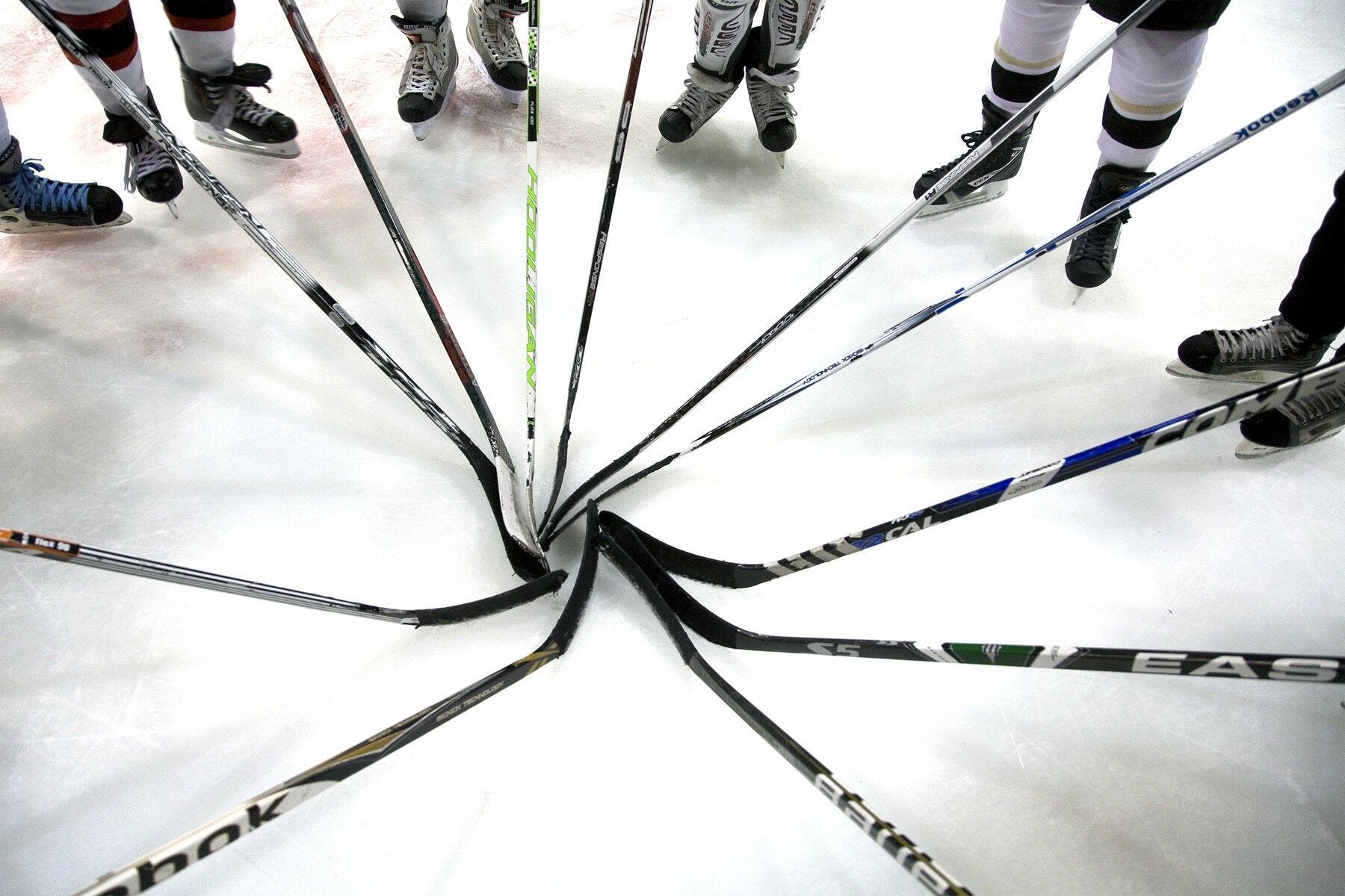 Hockey sticks in circle