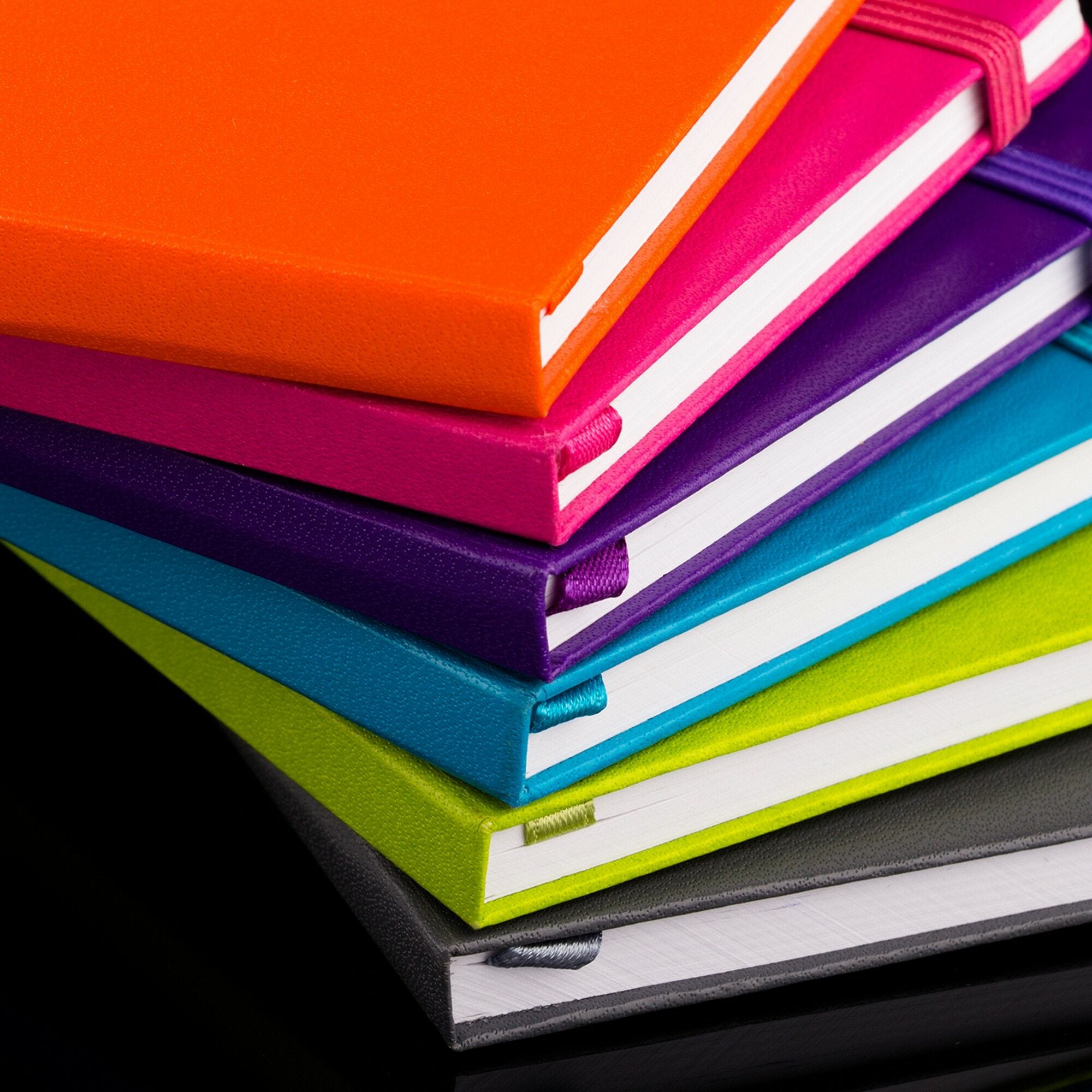 colored journals stack, notebooks supply