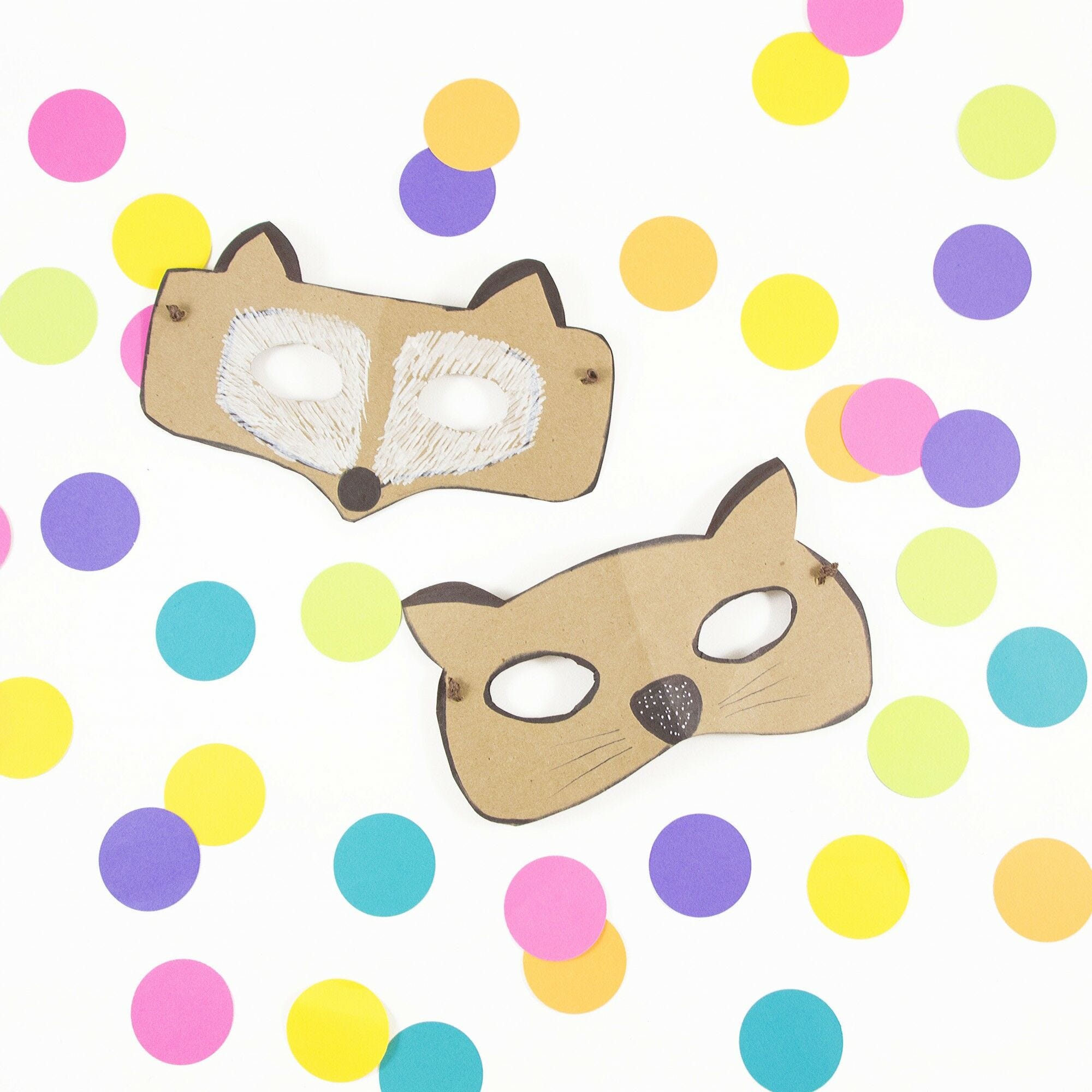 Completed paper animal masks finished last minute diy halloween costume kraft raccoon and cat animal masks