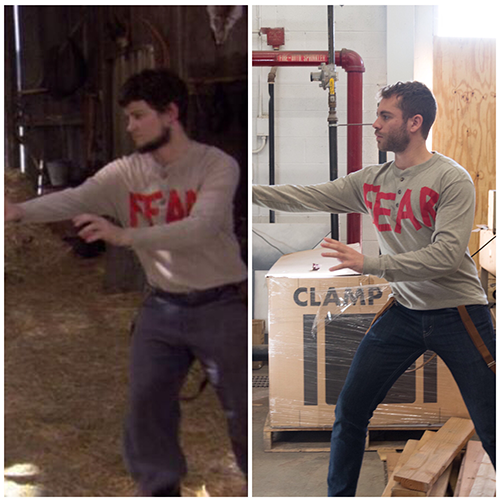 men in gray shirts with red fear text and arms outstretched