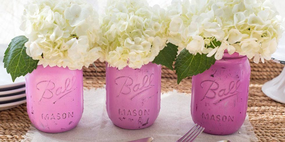 lavender purple painted mason jar vases with large white flowers
