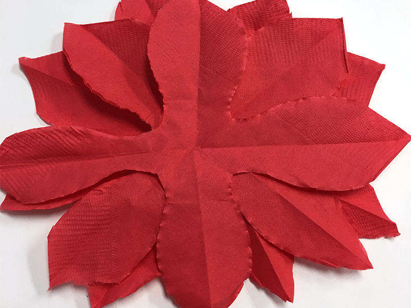 align layers of diy paper cocktail napkin poinsettias petals