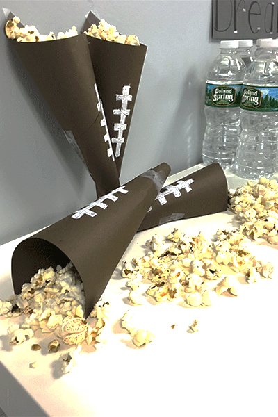 how to host a football party, paper, brown, popcorn, football