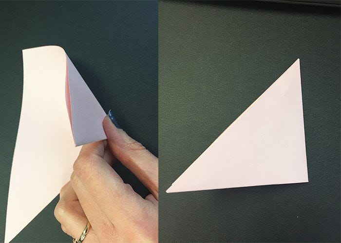paper folded into smaller triangle triangle folded in half
