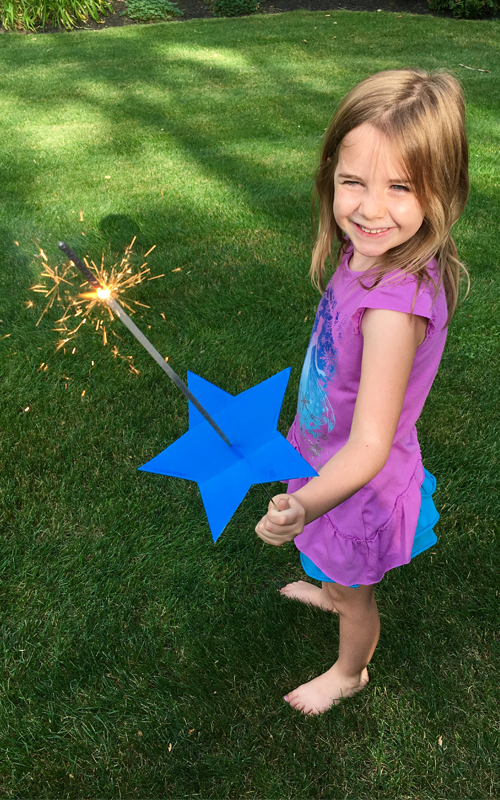 blue star, sparkler, girl with sparkler, fourth of july